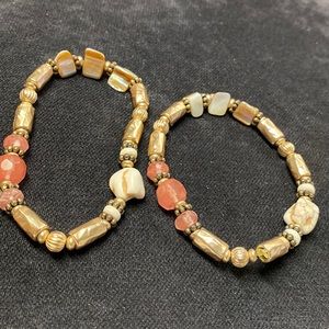 Two stretch bracelets.  Gold-tone, beads and rose-color stones.